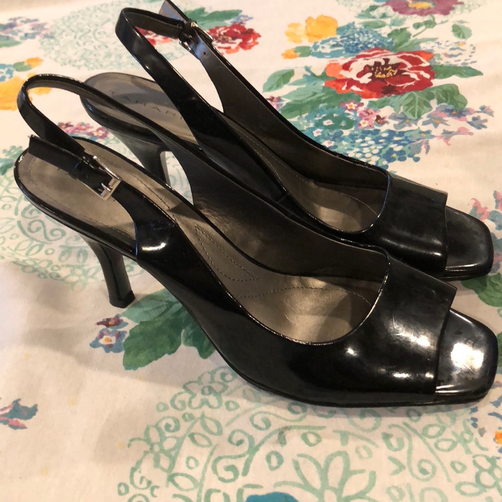 Tahari black patent leather open toe sling backs.